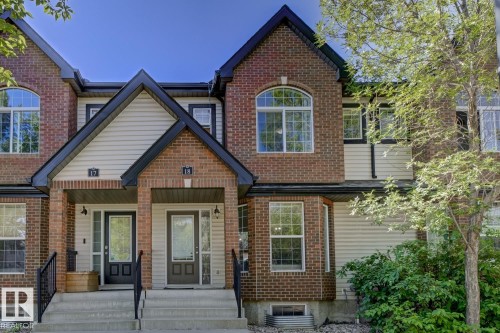 View of front of house with brick siding - 18 5281 Terwillegar Boulevard, Edmonton, AB - Outdoor With Facade