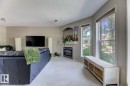 18 5281 Terwillegar Boulevard, Edmonton, AB  - Indoor Photo Showing Living Room With Fireplace 