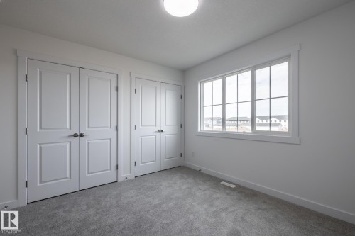 14 7110 Keswick Common, Edmonton, AB - Indoor Photo Showing Other Room