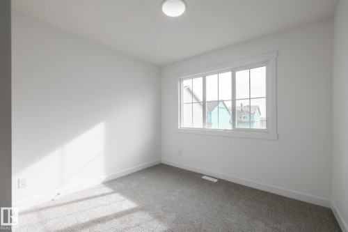 14 7110 Keswick Common, Edmonton, AB - Indoor Photo Showing Other Room
