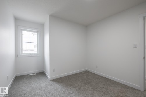 14 7110 Keswick Common, Edmonton, AB - Indoor Photo Showing Other Room