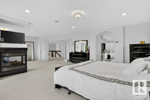 1128 119 Street, Edmonton, AB - Indoor Photo Showing Bedroom With Fireplace
