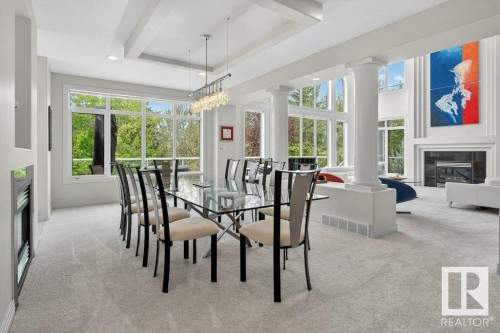 1128 119 Street, Edmonton, AB - Indoor Photo Showing Dining Room With Fireplace