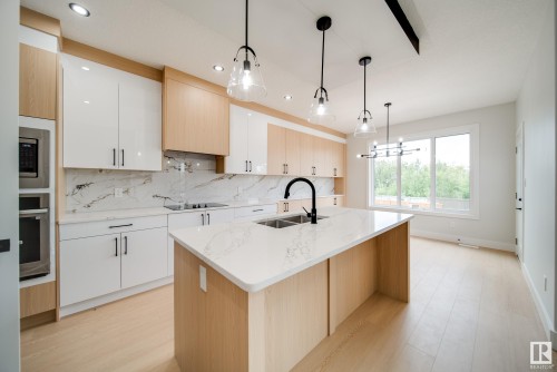 8824 183 Avenue, Edmonton, AB - Indoor Photo Showing Kitchen With Double Sink With Upgraded Kitchen