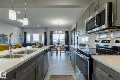 10716 99 Street, Morinville, AB - Indoor Photo Showing Kitchen With Double Sink With Upgraded Kitchen