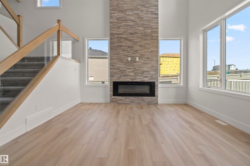 92 Eldridge Point(E), St. Albert, AB - Indoor Photo Showing Living Room With Fireplace