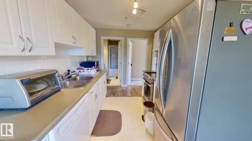 208 11446 40 Avenue, Edmonton, AB - Indoor Photo Showing Kitchen With Double Sink