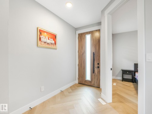 Entrance foyer with baseboards - 15 Elwyck Gate, Spruce Grove, AB - Indoor Photo Showing Other Room