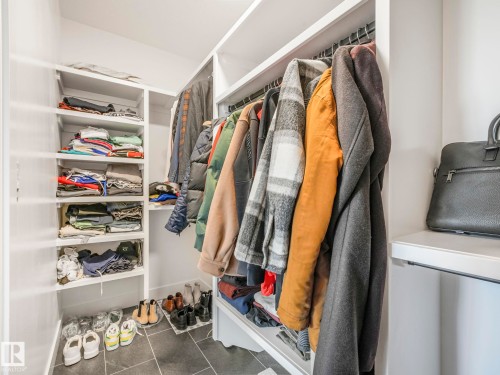 Walk in closet featuring tile patterned flooring - 15 Elwyck Gate, Spruce Grove, AB - Indoor With Storage