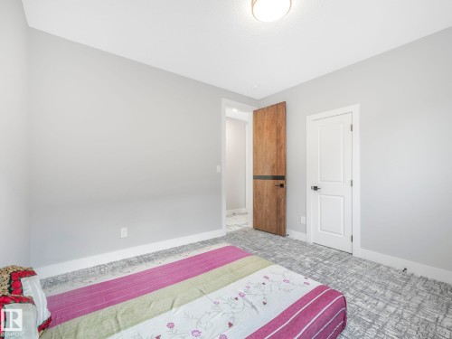 Bedroom with baseboards - 15 Elwyck Gate, Spruce Grove, AB - Indoor Photo Showing Bedroom