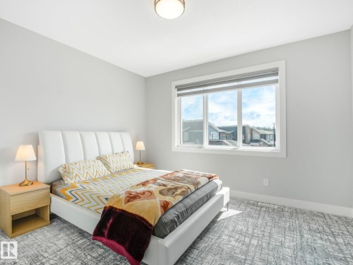 Carpeted bedroom featuring baseboards - 15 Elwyck Gate, Spruce Grove, AB - Indoor Photo Showing Bedroom