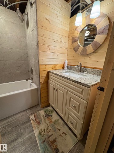 Located in lower level. - B58018 Hiway 29, Rural St. Paul County, AB - Indoor Photo Showing Bathroom