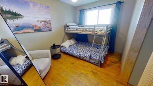 8 Lake Avenue, Rural Wetaskiwin County, AB - Indoor Photo Showing Bedroom