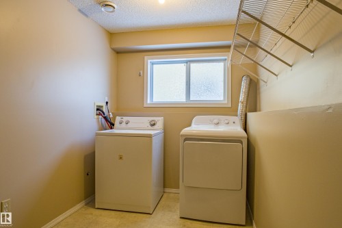 10 16777 91 Street, Edmonton, AB - Indoor Photo Showing Laundry Room