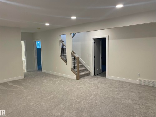 Finished below grade area featuring carpet and recessed lighting - 4112 Ginsburg Place, Edmonton, AB - Indoor Photo Showing Other Room