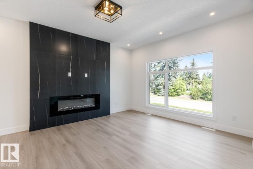 7906 75 Street, Edmonton, AB - Indoor Photo Showing Other Room With Fireplace