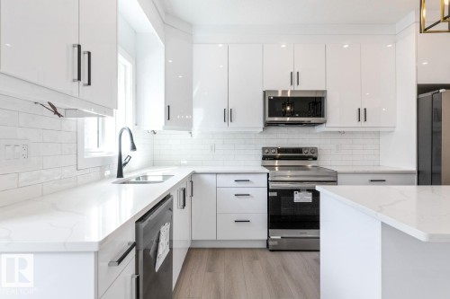 7906 75 Street, Edmonton, AB - Indoor Photo Showing Kitchen With Double Sink With Upgraded Kitchen