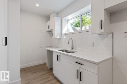 7906 75 Street, Edmonton, AB - Indoor Photo Showing Kitchen With Double Sink