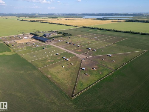 Aerial view of sparsely populated area featuring farmland - 53524 Range Road 263A, Rural Sturgeon County, AB - Outdoor With View