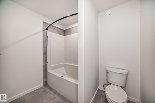 Full bathroom with  shower combination and tile patterned floors - 1401 Ainslie Wynd, Edmonton, AB - Indoor Photo Showing Bathroom