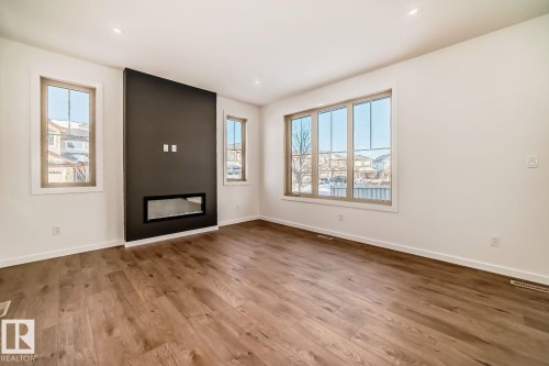 1365 Ainslie Wynd, Edmonton, AB - Indoor With Fireplace