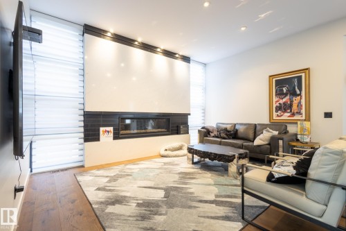 14027 91A Avenue, Edmonton, AB - Indoor Photo Showing Living Room With Fireplace