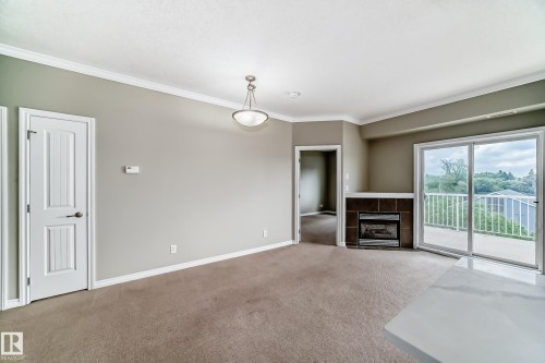 423 8528 82 Avenue, Edmonton, AB - Indoor With Fireplace