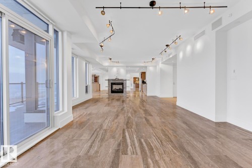 1900 10035 Saskatchewan Drive, Edmonton, AB - Indoor With Fireplace