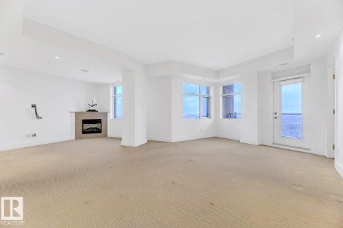 1900 10035 Saskatchewan Drive, Edmonton, AB - Indoor With Fireplace