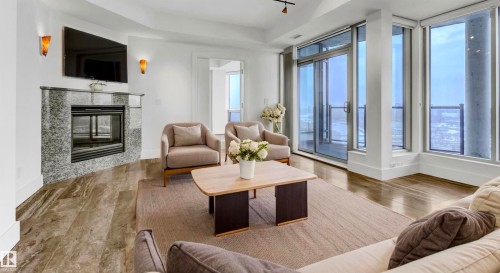 1900 10035 Saskatchewan Drive, Edmonton, AB - Indoor Photo Showing Living Room With Fireplace