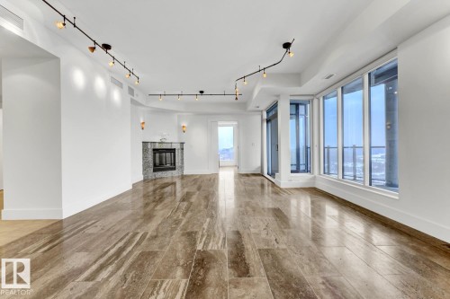 1900 10035 Saskatchewan Drive, Edmonton, AB - Indoor With Fireplace