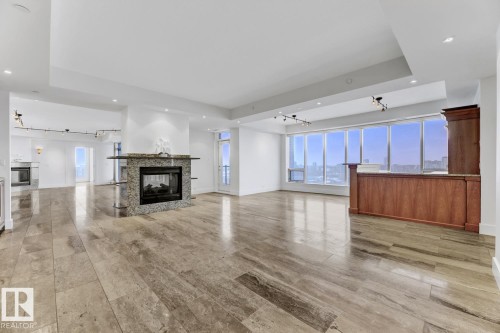 1900 10035 Saskatchewan Drive, Edmonton, AB - Indoor Photo Showing Living Room With Fireplace