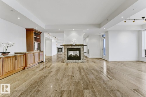 1900 10035 Saskatchewan Drive, Edmonton, AB - Indoor Photo Showing Living Room With Fireplace