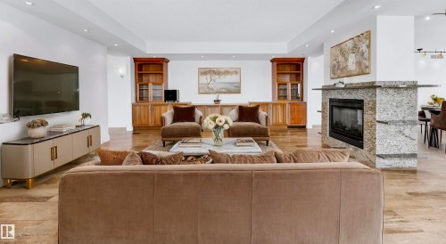 1900 10035 Saskatchewan Drive, Edmonton, AB - Indoor Photo Showing Living Room With Fireplace