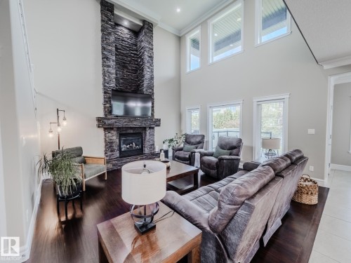 1606 Adamson Close, Edmonton, AB - Indoor Photo Showing Living Room With Fireplace