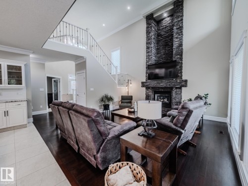 1606 Adamson Close, Edmonton, AB - Indoor Photo Showing Other Room With Fireplace