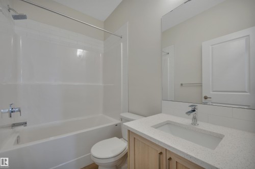Bathroom with shower / bath combination and vanity - 9104 Elves Loop, Edmonton, AB - Indoor Photo Showing Bathroom