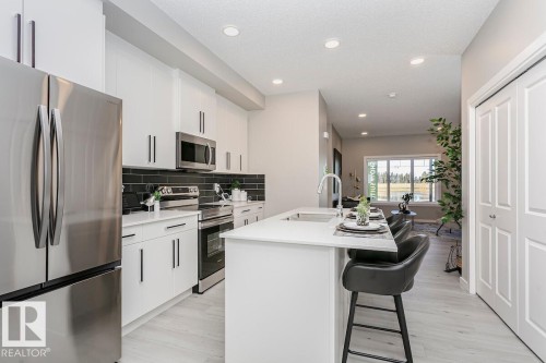 703 Cambrian Boulevard, Sherwood Park, AB - Indoor Photo Showing Kitchen With Upgraded Kitchen