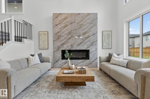 341 Roberts Wynd, Leduc, AB - Indoor Photo Showing Living Room With Fireplace