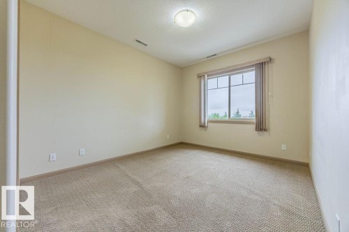 404 501 Palisades Way, Sherwood Park, AB - Indoor Photo Showing Other Room
