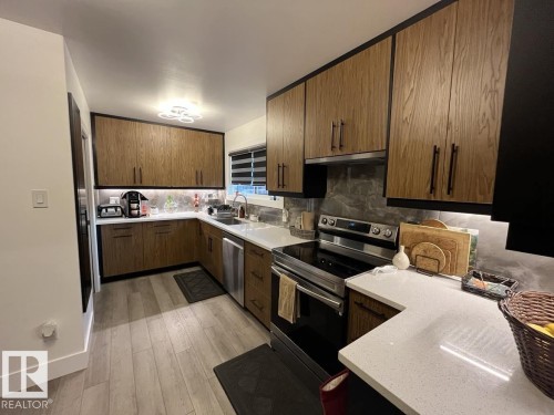 12904 95 Street, Edmonton, AB - Indoor Photo Showing Kitchen With Double Sink