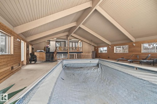 23 Westbrook Drive, Edmonton, AB - Indoor Photo Showing Other Room With In Ground Pool