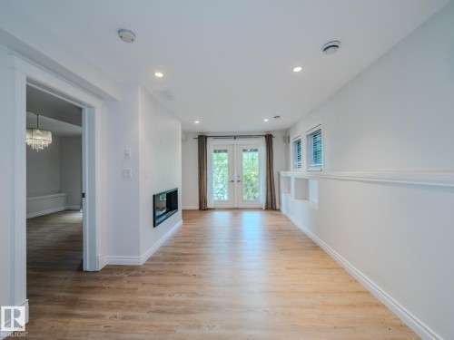 10067 93 Street, Edmonton, AB - Indoor Photo Showing Other Room With Fireplace