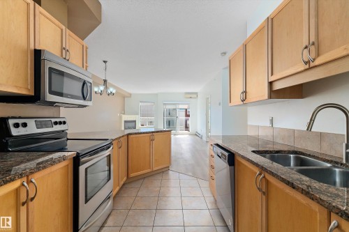 407 5 Perron Street, St. Albert, AB - Indoor Photo Showing Kitchen With Stainless Steel Kitchen With Double Sink