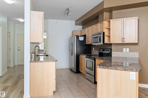 407 5 Perron Street, St. Albert, AB - Indoor Photo Showing Kitchen With Stainless Steel Kitchen With Double Sink