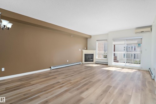 407 5 Perron Street, St. Albert, AB - Indoor With Fireplace