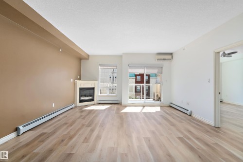 407 5 Perron Street, St. Albert, AB - Indoor Photo Showing Living Room With Fireplace