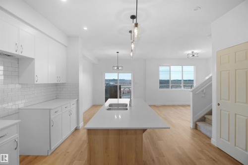 1332 11 Avenue, Edmonton, AB - Indoor Photo Showing Kitchen With Double Sink
