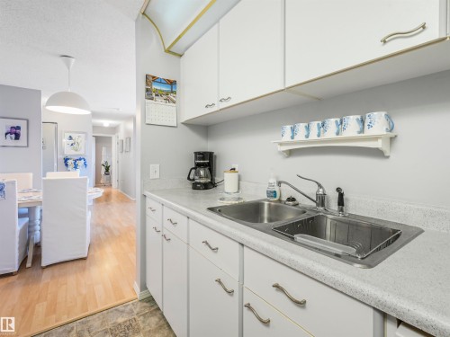 318 6710 158 Avenue, Edmonton, AB - Indoor Photo Showing Kitchen With Double Sink