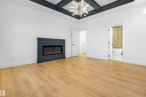 733 Astoria Way, Devon, AB - Indoor Photo Showing Living Room With Fireplace